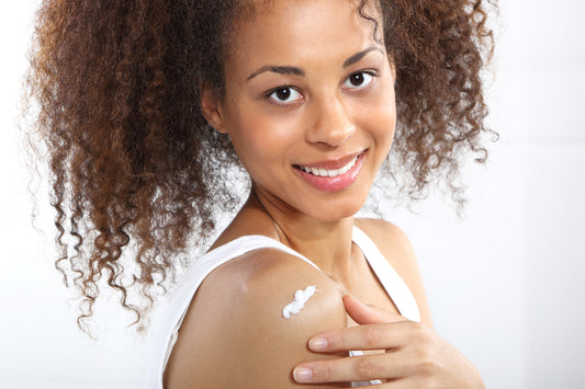 Dry skin cream on woman